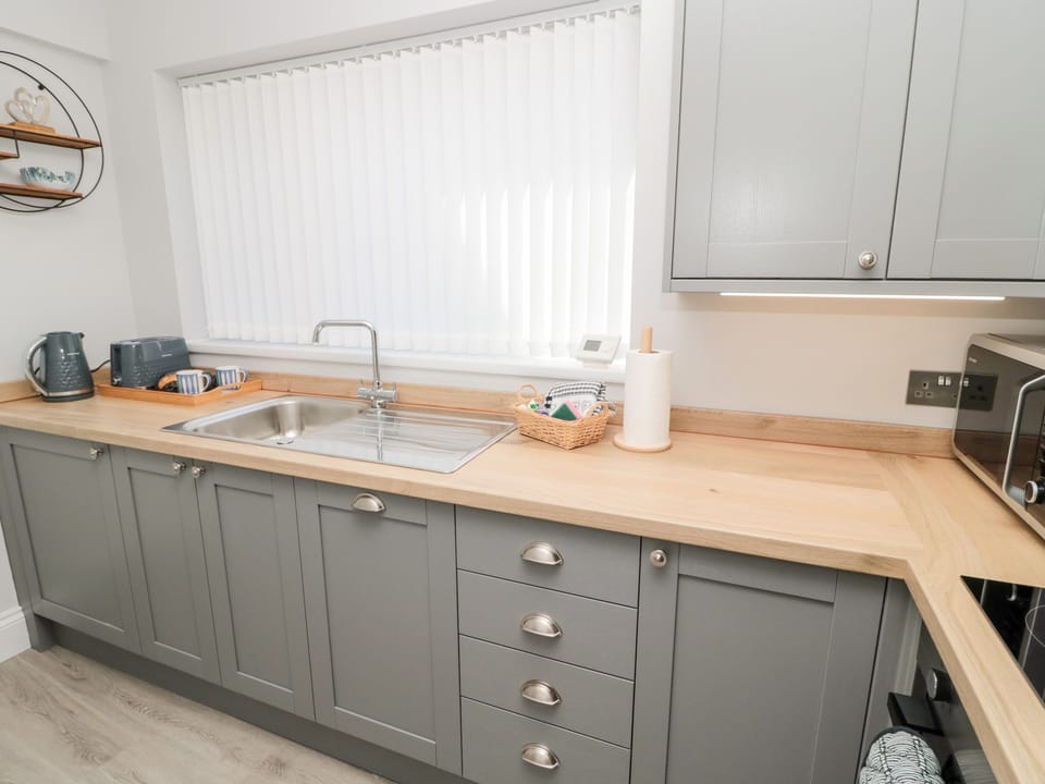 Fridge, electric kettle, toaster, cookware/dishes/utensils