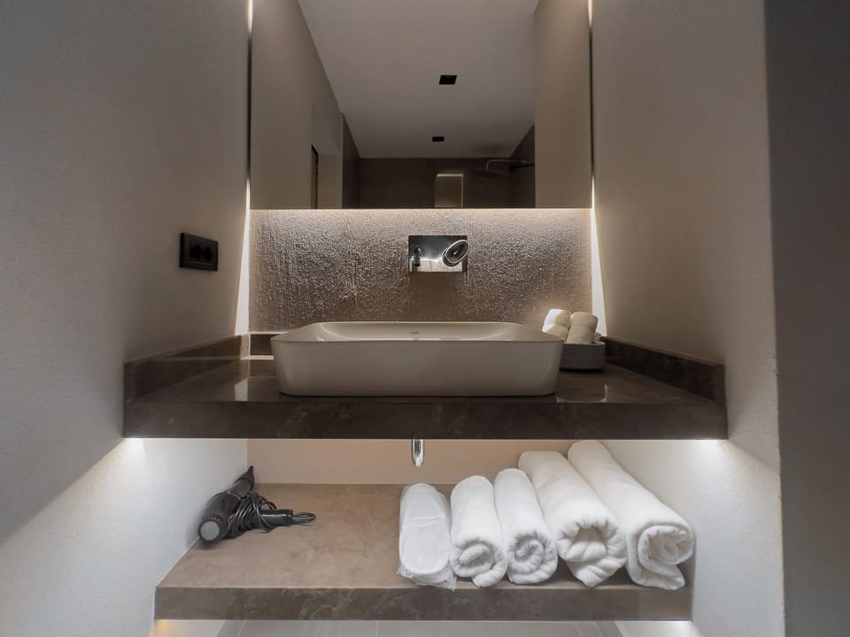 Free toiletries, hair dryer, slippers, bidet
