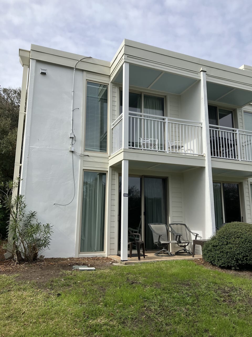 Balcony and deck below on the end of the building