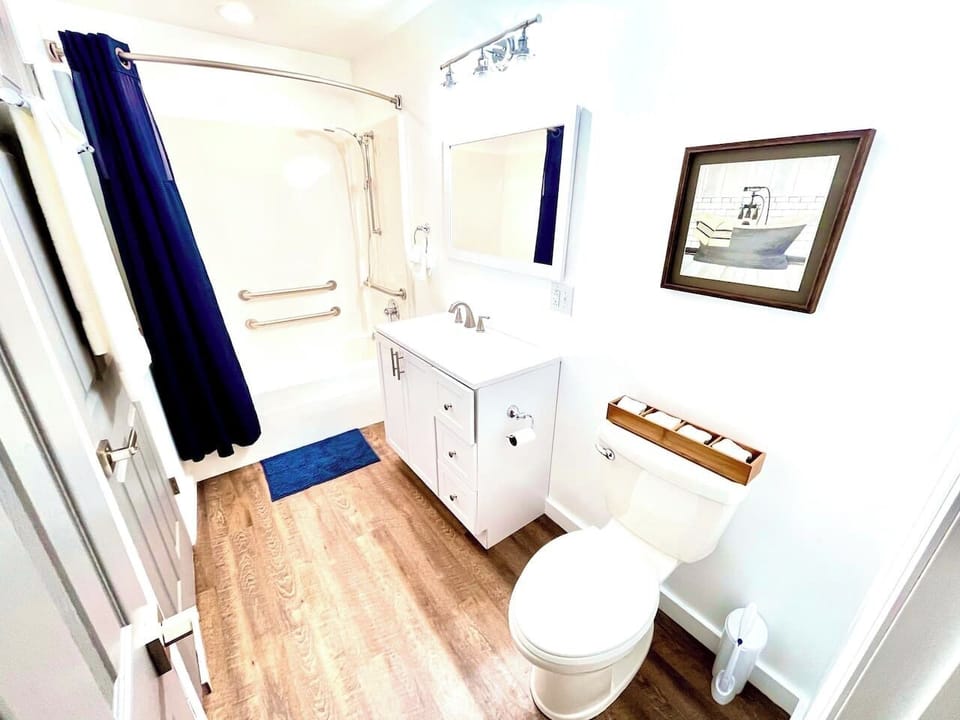 Newly renovated bathroom with shower/tub combo.