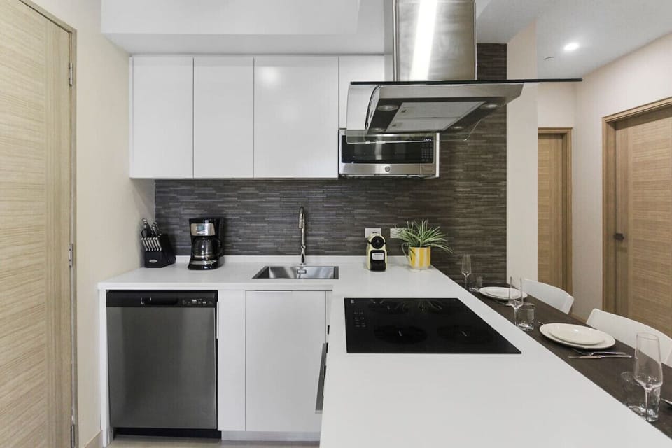 The kitchen is fully furnished with state-of-the-art cooking utensils, making it perfect for cooking any meal, from a quick breakfast to a three-course gourmet dinner.
