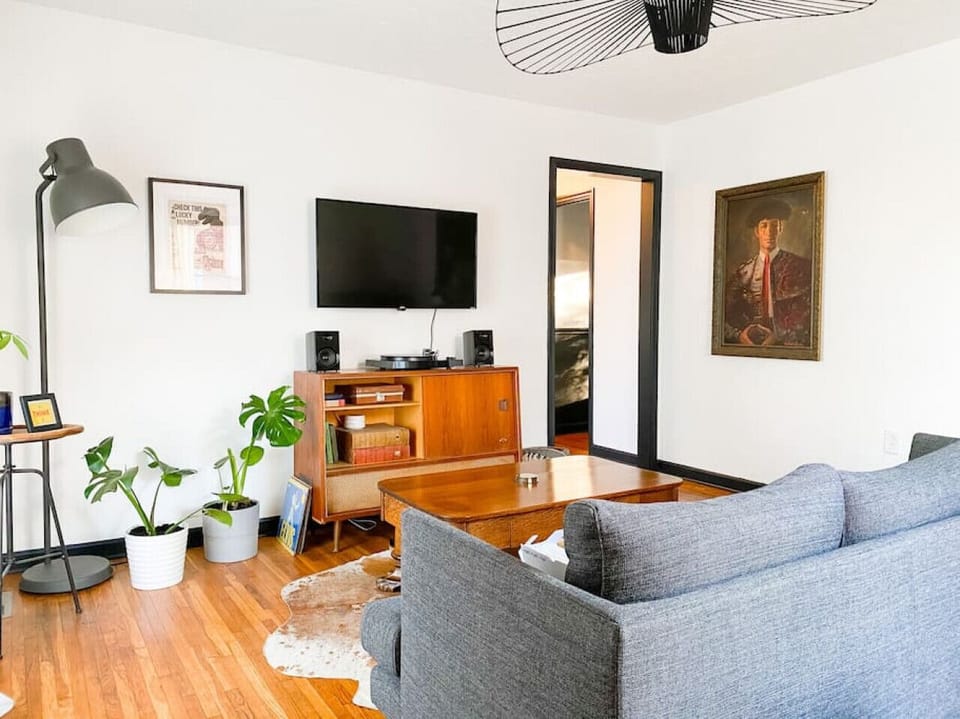 Cozy living room with a sleeper sofa, Record player, Smart TV and high-speed WiFi. Air Mattress also available.