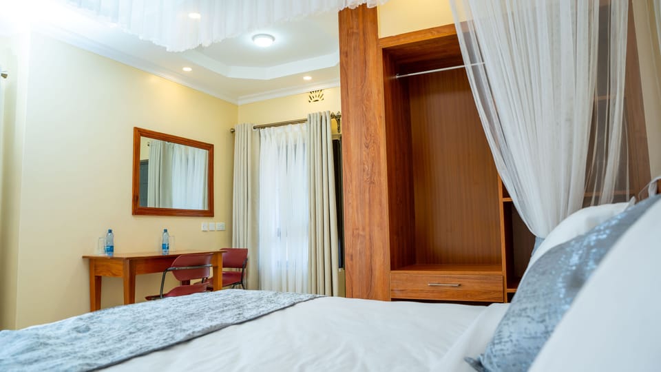 Individually furnished, desk, laptop workspace, blackout drapes
