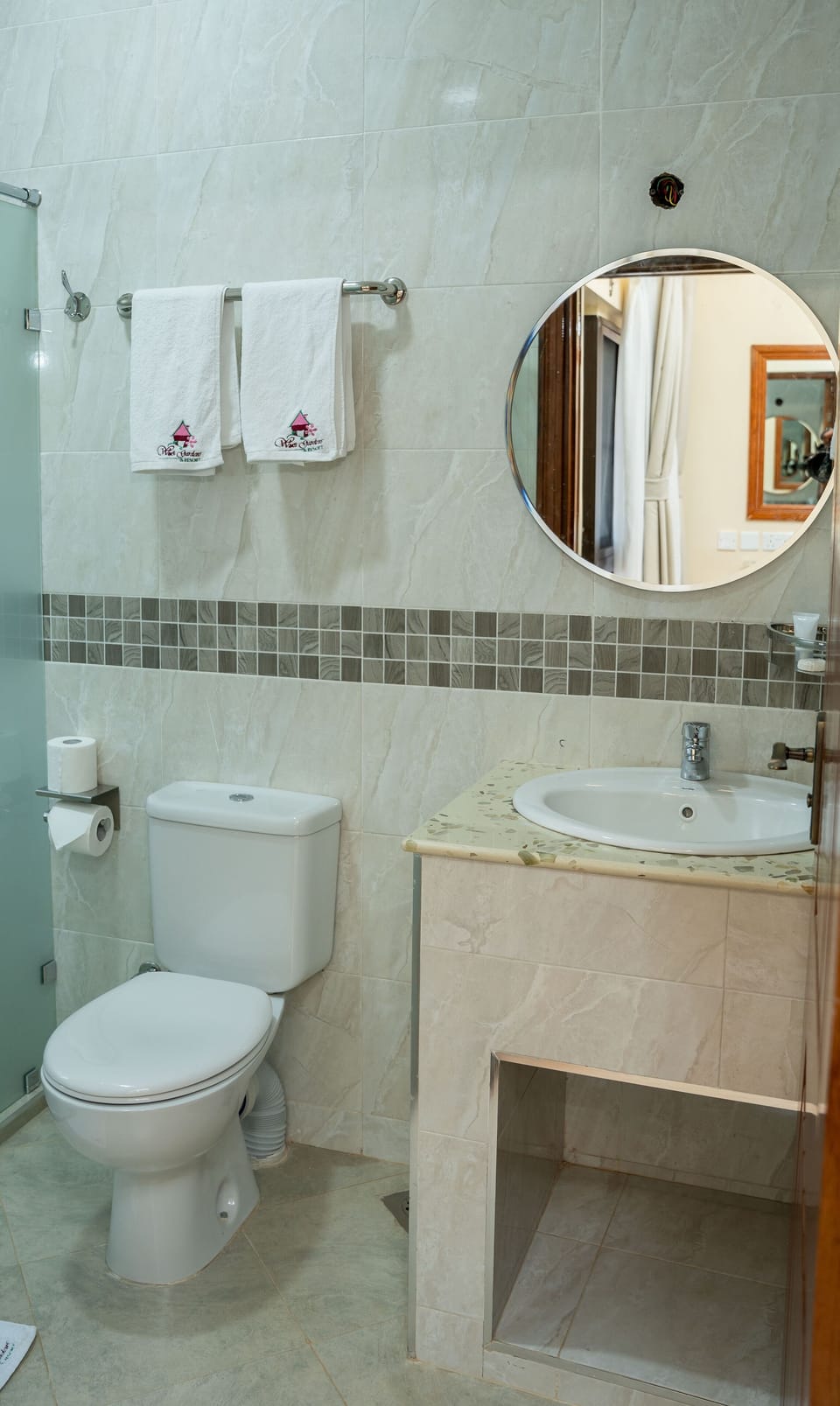 Shower, rainfall showerhead, slippers, towels