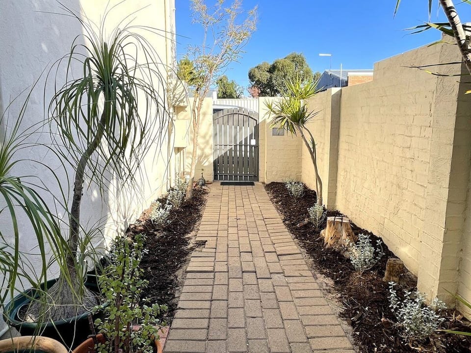 Courtyard entry pathway to Apartment
