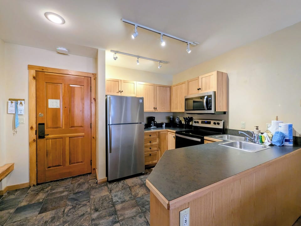 Your fully equipped kitchen features modern appliances, ample counter space, and everything you need to prepare meals—perfect for a comfortable, home-away-from-home stay.