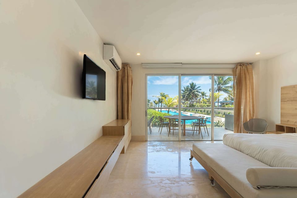 Comfortable bedroom with modern TV