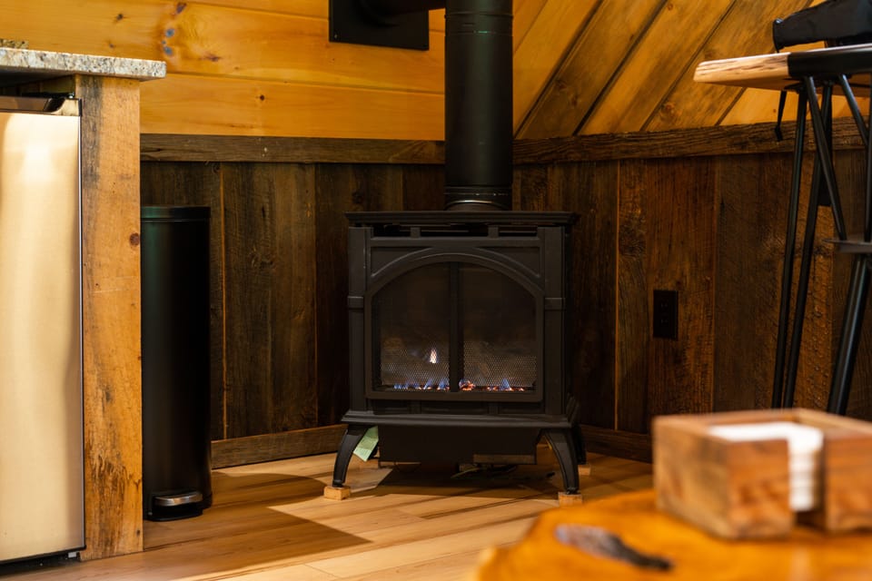 The gas fireplace keeps the cabin warm in the winter months!
