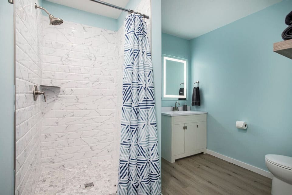 Bathroom #2 has a tiled shower and is connected to bedroom #3