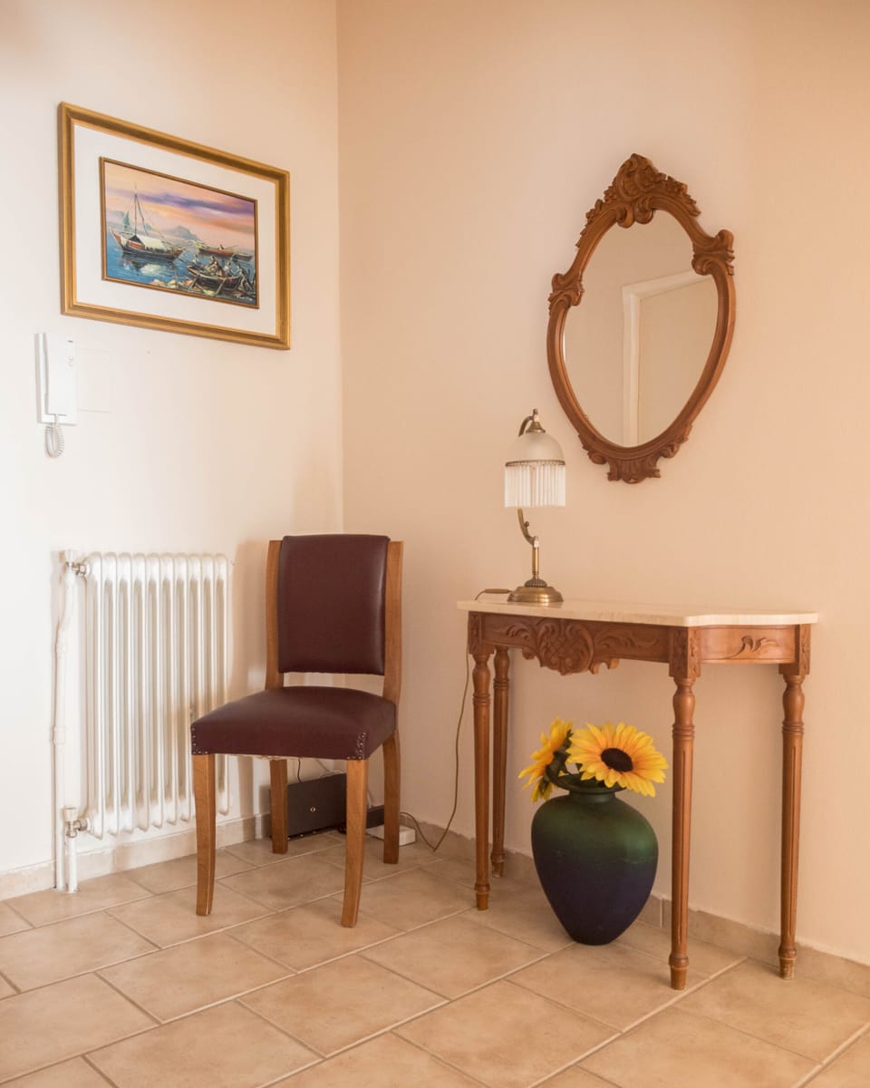 Panoramic Apartment | Living area | 27-inch flat-screen TV with cable channels, TV