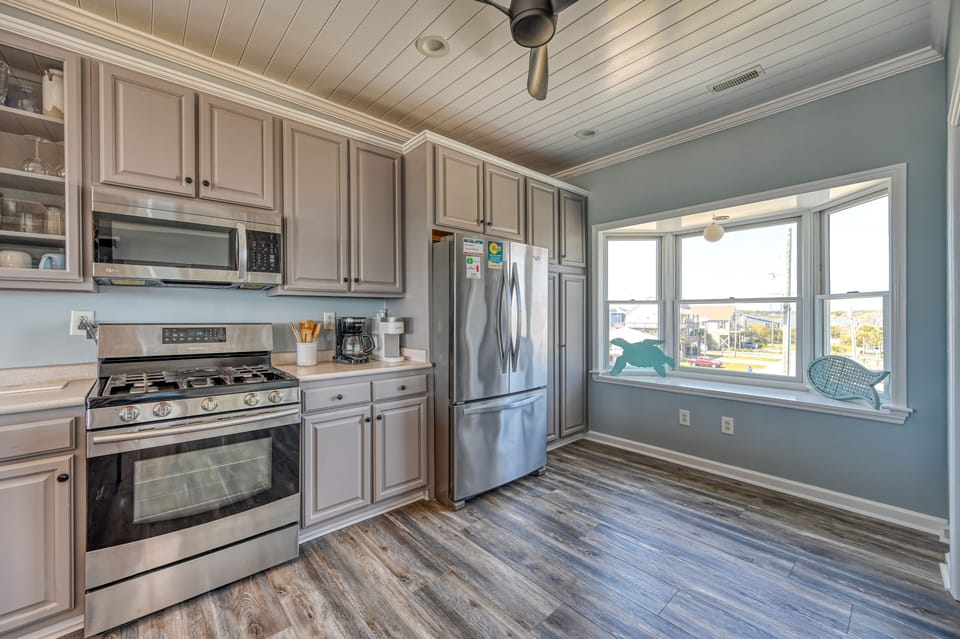 Enjoy breathtaking sunset views from a kitchen window.
