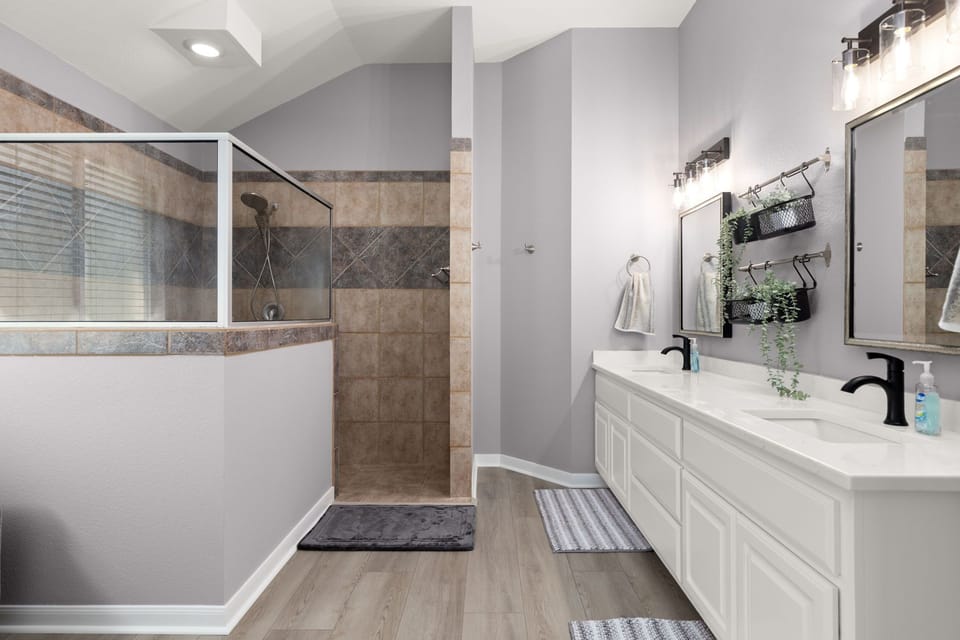 Master Bathroom with double vanities and walk-in shower 
