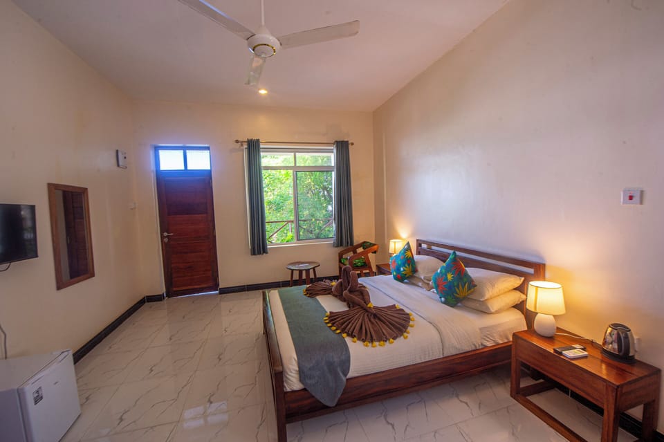 Family Double or Twin Room | In-room safe, desk, laptop workspace, blackout drapes