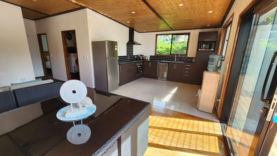 Comfort Suite | Private kitchen | Espresso maker, full-size fridge, microwave, oven