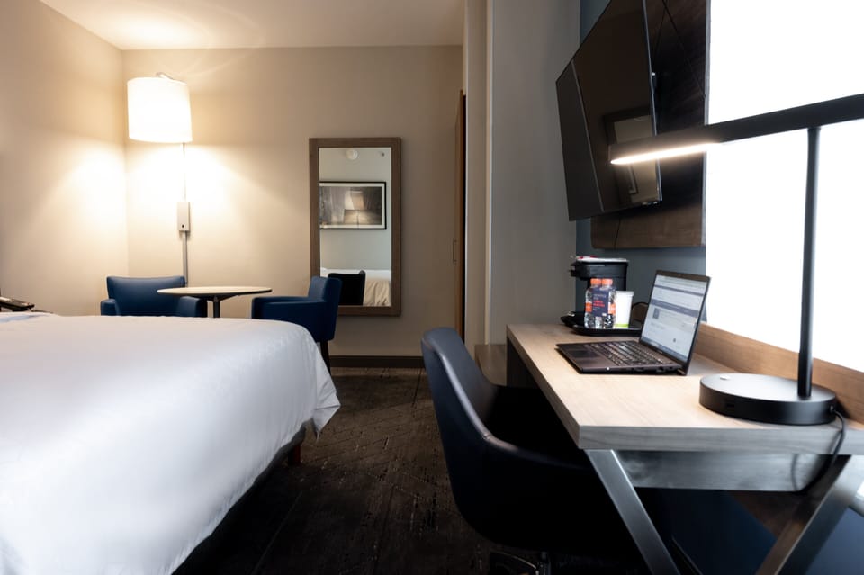 Suite, 1 King Bed | In-room safe, desk, soundproofing, free cribs/infant beds
