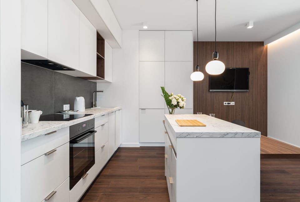The fully equipped kitchenette includes everything you need for a home-cooked meal.
