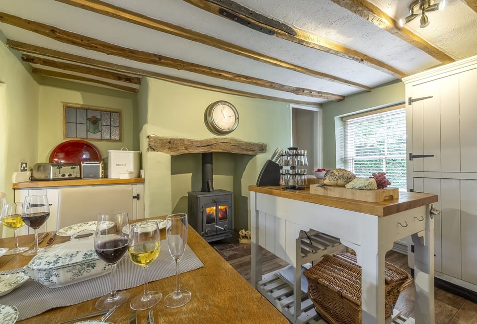 Ground floor: Large kitchen/dining room with wood burning stove