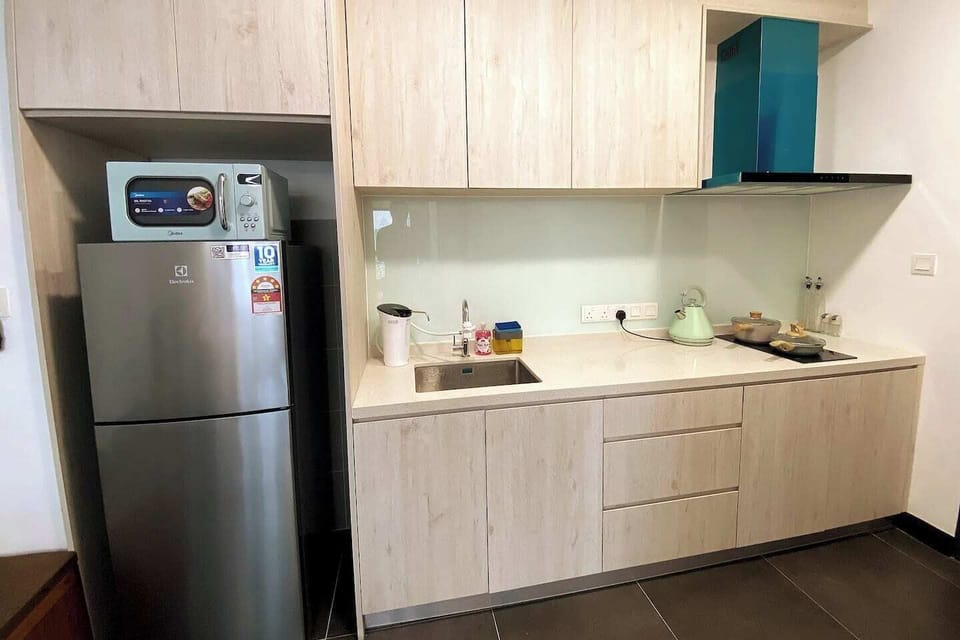 Our kitchen space for your cooking needs during your stay at our home.  Equipment includes 20cm saucepan, 20cm frying pan, kettle, microwave and refrigerator, free complimentary for your use. Also provided are cooking oil, salt and pepper. Enjoy~