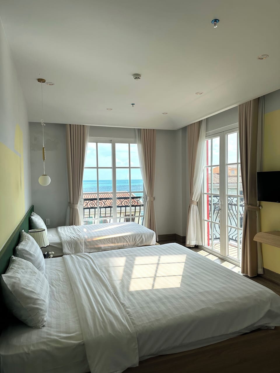 Superior Triple Room, Balcony, Beach View | Egyptian cotton sheets, premium bedding, down comforters