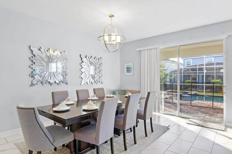 Gather around the beautifully appointed dining table, where stylish surroundings and generous seating create the perfect setting for memorable family dinners, celebrations, and evenings spent together.