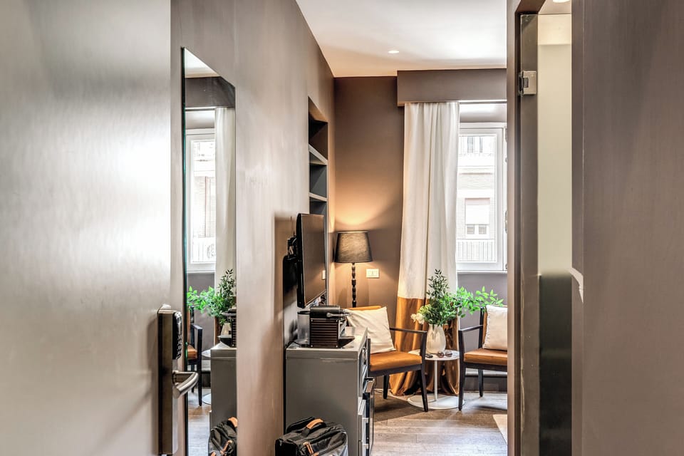 Deluxe Room | Premium bedding, down comforters, minibar, in-room safe
