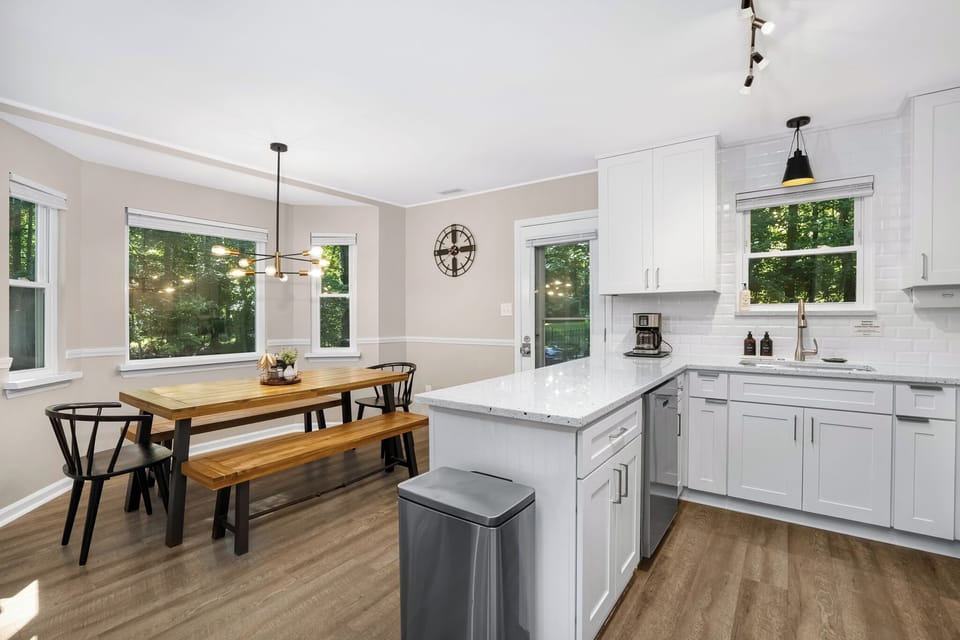 "Fully stocked kitchen with a Dining Table"