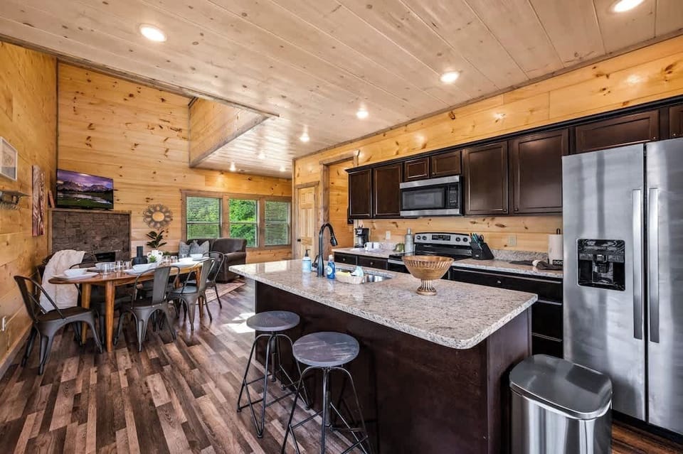 The kitchen is thoughtfully stocked with basic cookware, utensils, and cutlery, ensuring you have all the tools necessary for your getaway.