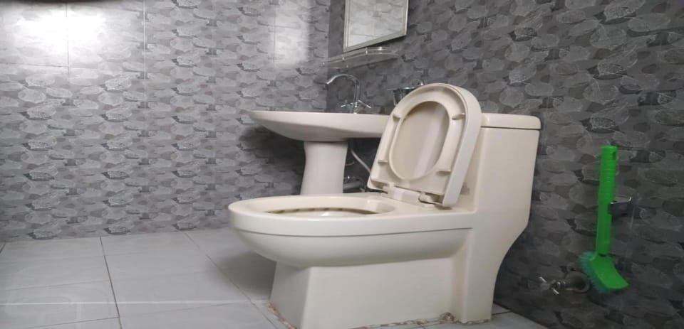 Shower, rainfall showerhead, towels, soap