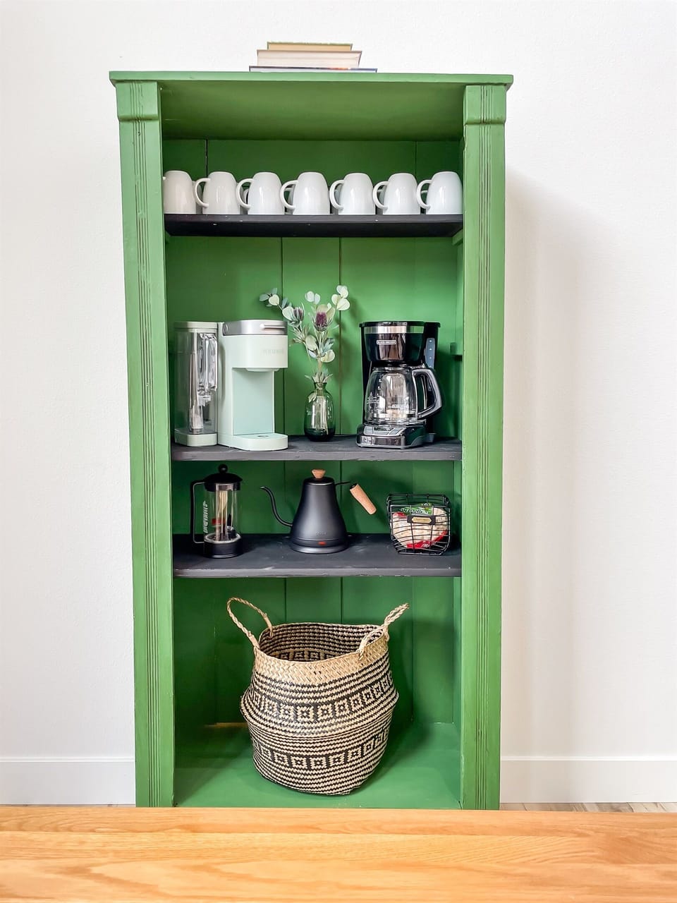 Coffee bar with coffee pot, keurig, electric tea kettle, and a french press