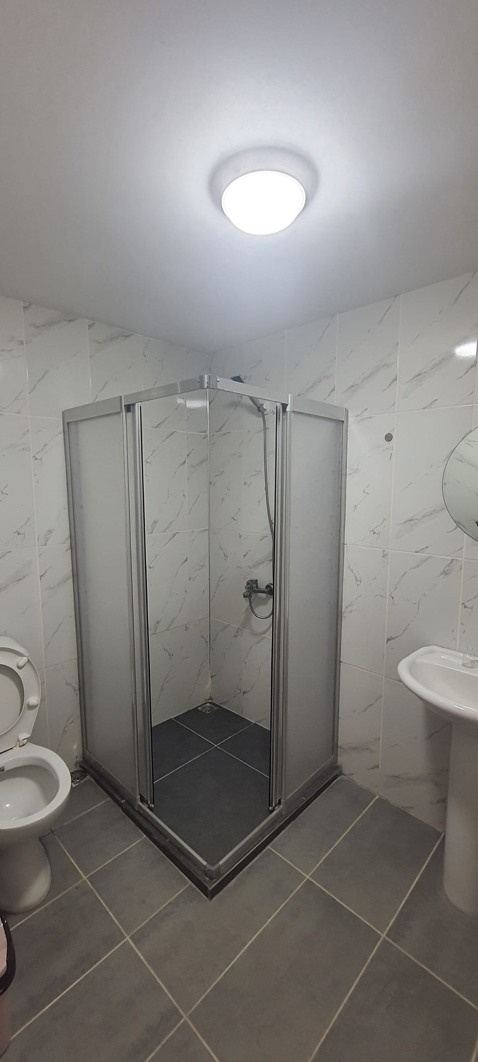 Basic Room | Bathroom | Shower, rainfall showerhead, hair dryer (on request), towels