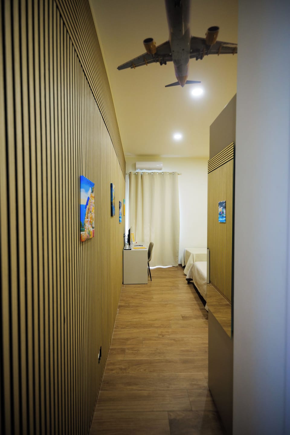 Deluxe Triple Room | Minibar, individually furnished, desk, laptop workspace