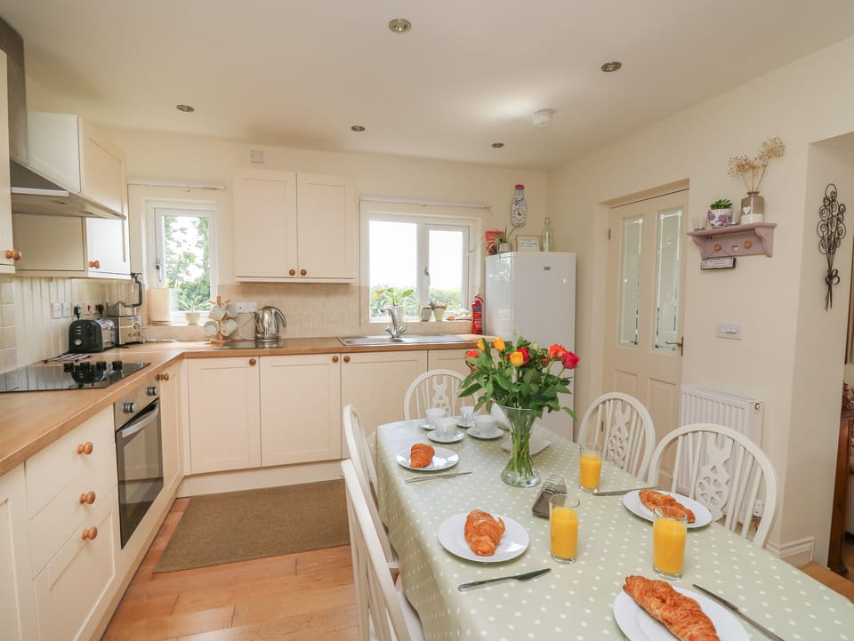 Fridge, electric kettle, toaster, cookware/dishes/utensils