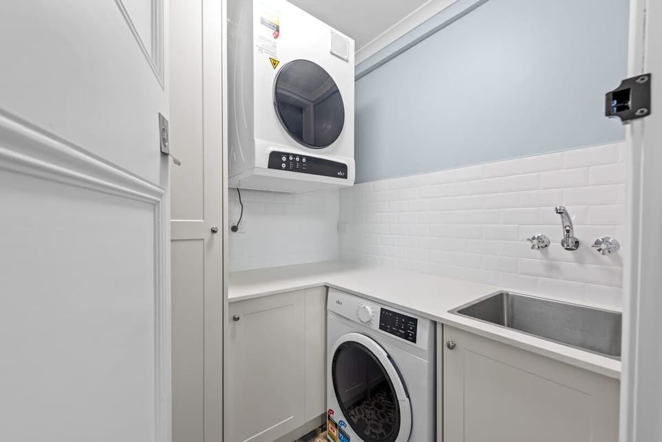 Shared laundry downstairs, clothesline outside + clothes airer in your apartment