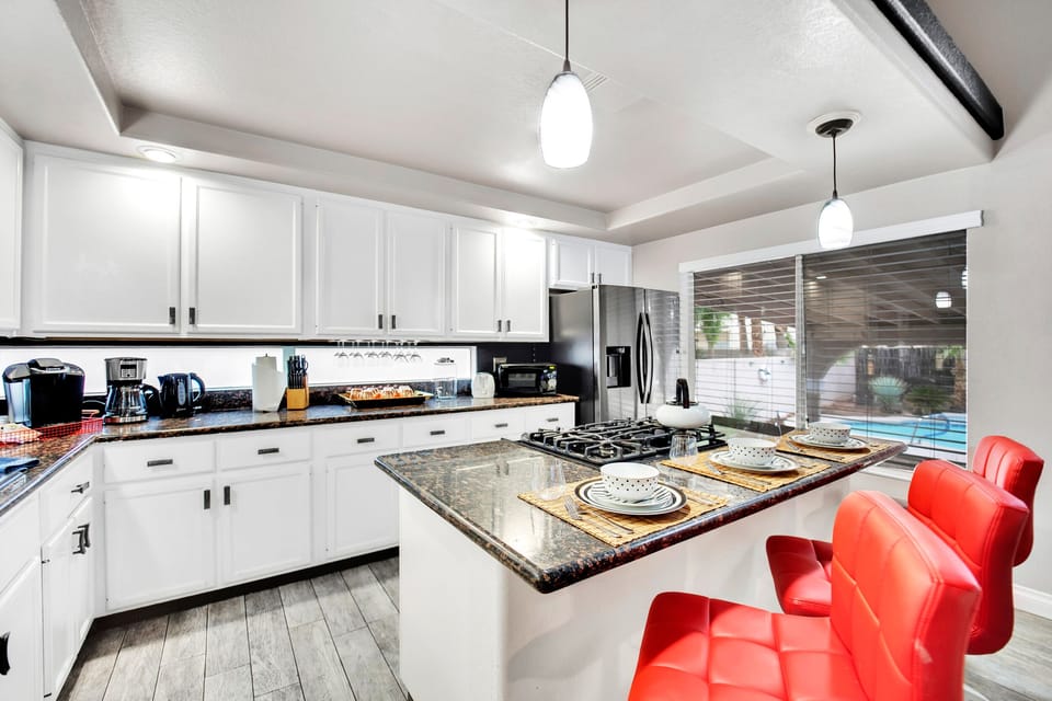 Cook up dinner on our gas stove while chatting with family and friends.