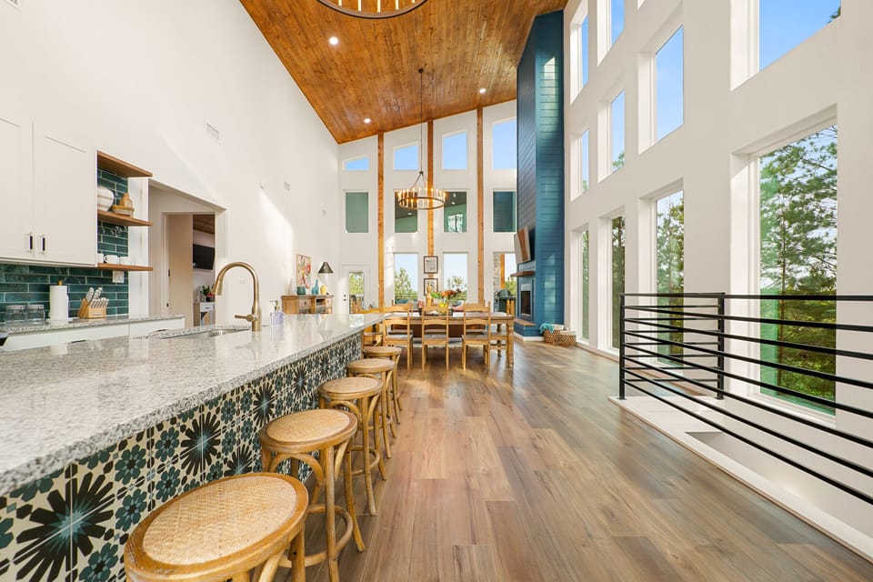 Soaring forty-foot ceilings and large walls of windows.