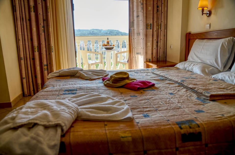 Twin Room with Terrace (Double or Twin Beds) | In-room safe, iron/ironing board (on request), WiFi (free), bed sheets