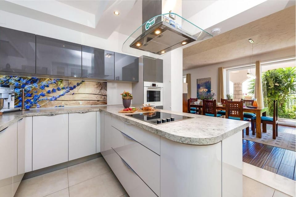 Villa | Private kitchen | Fridge, microwave, oven, stovetop