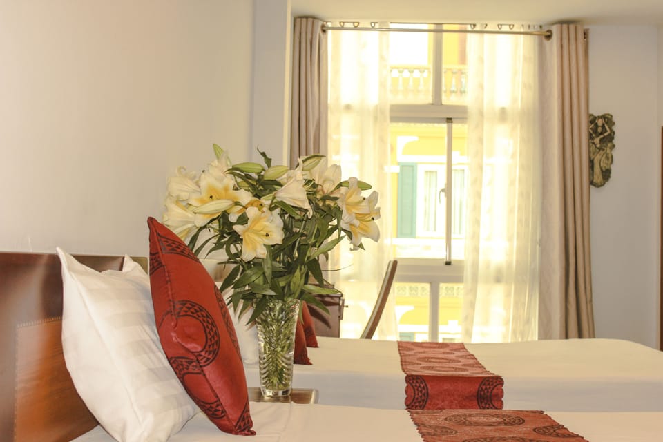 Deluxe Triple Room | Bathroom | Shower, hair dryer, slippers, bidet