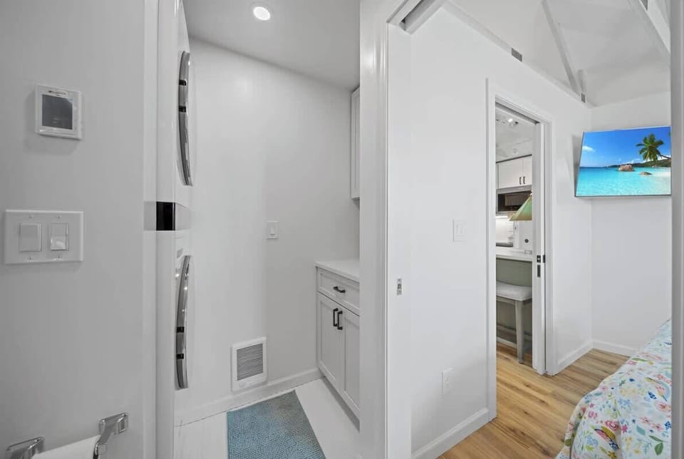 Laundry room with washer and dryer. Countertop space for folding items as you go