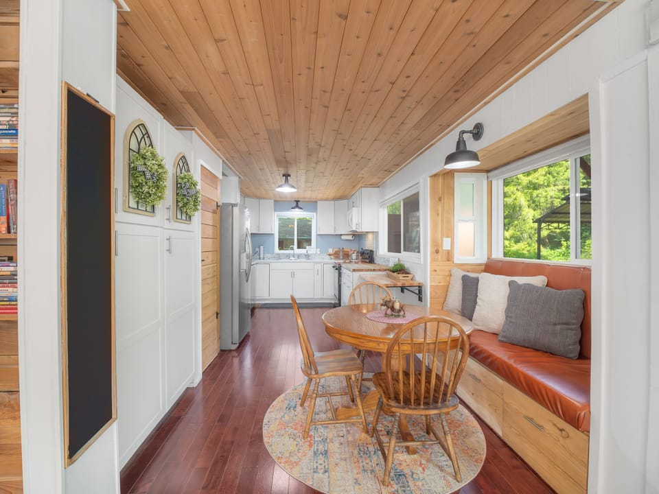 Flexible dining options indoors or at the deck’s picnic table.