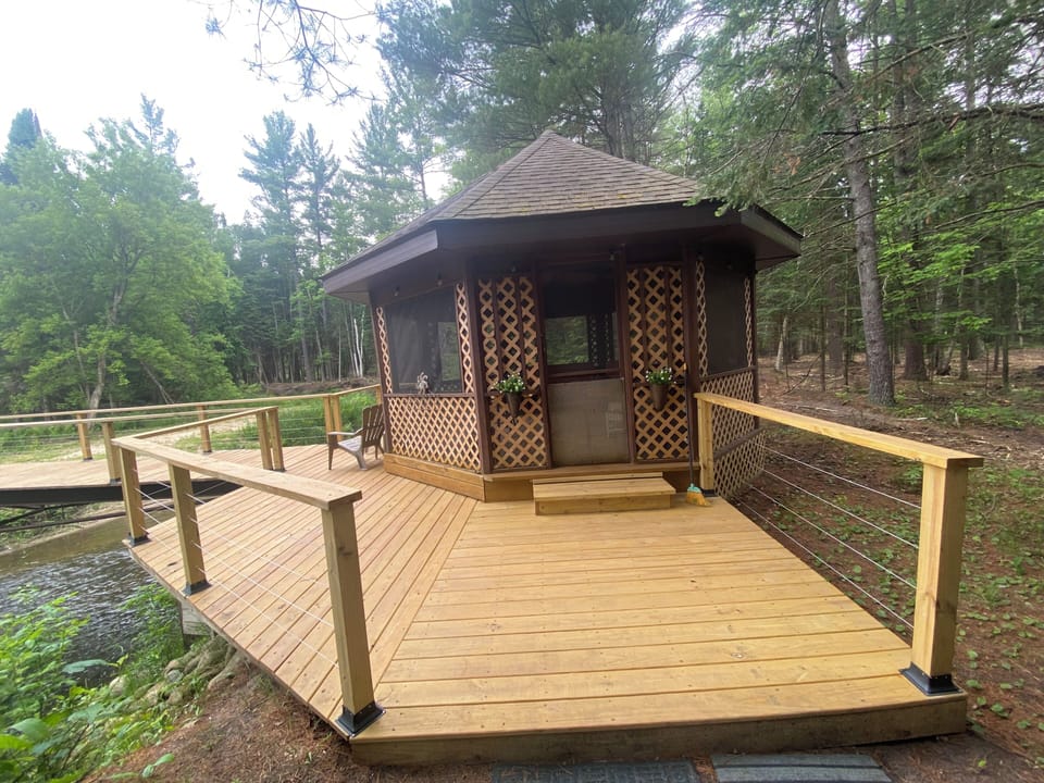 Covered /screened gazebo on the river.