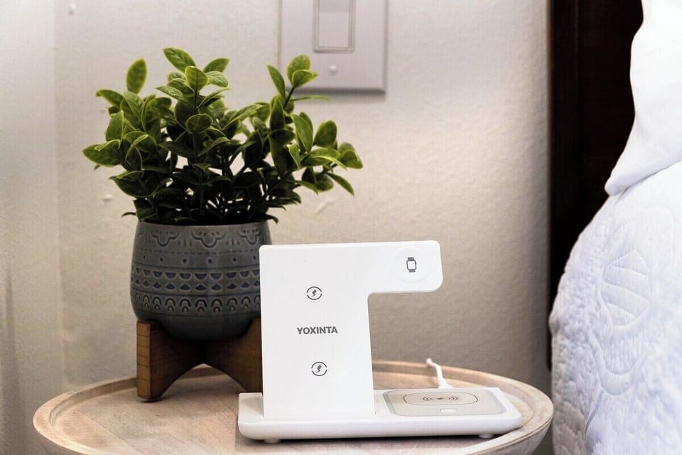 Power up wirelessly: Stay charged with a cellphone charging station at home.