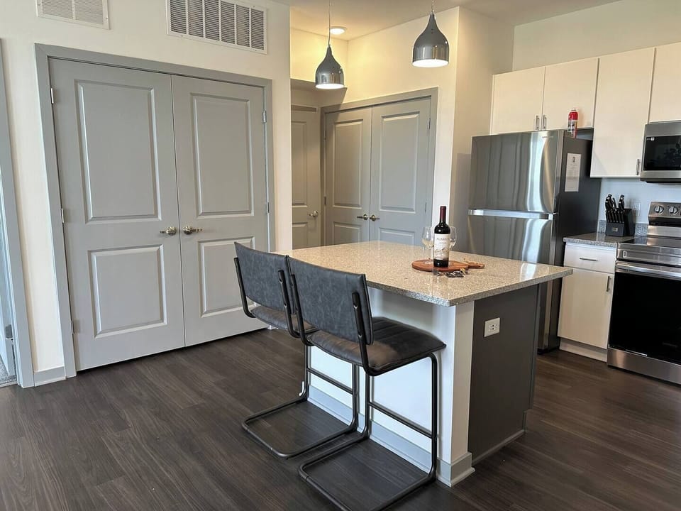 Clean, modern, and comfortable - perfect for cooking or just relaxing with new friends