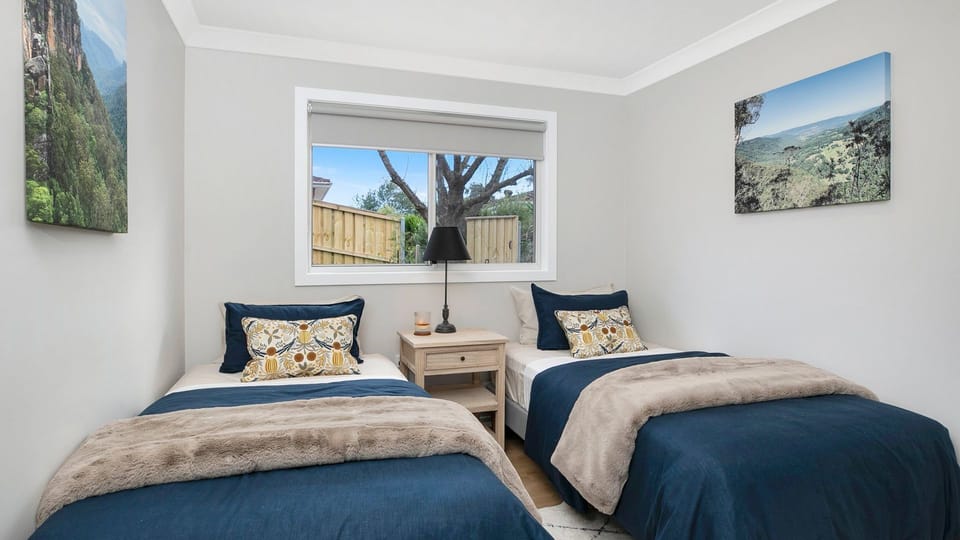 Blue Hen | Bedroom 2 | 2 single beds | Highchair and Portacot available 
