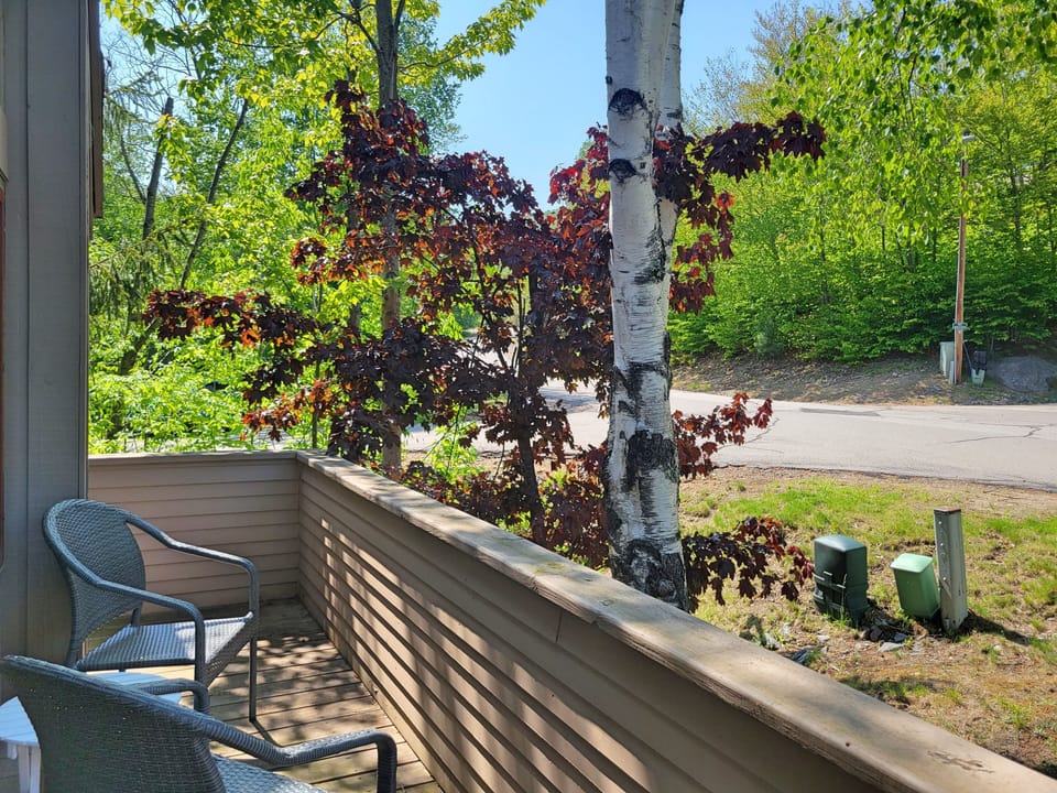 Second part of deck with seating and view to shuttle stop