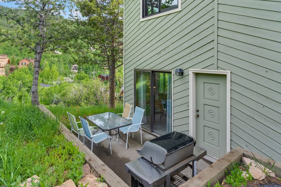 Patio with Grill and Table - Peaceful Yard