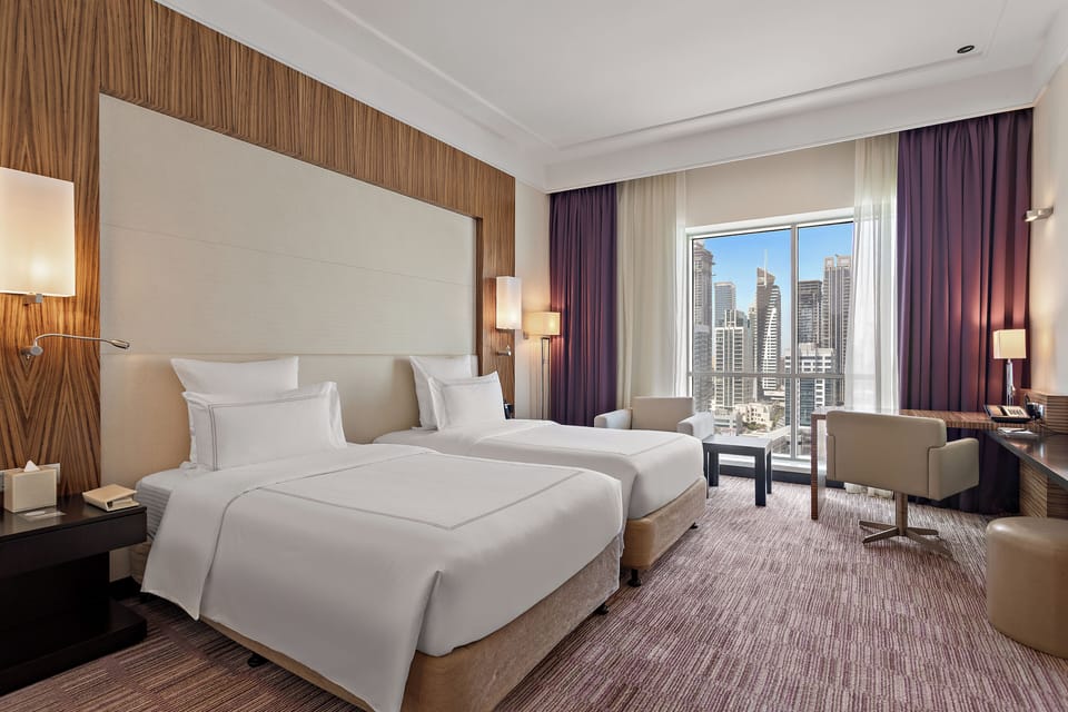 Premium bedding, pillowtop beds, minibar, in-room safe