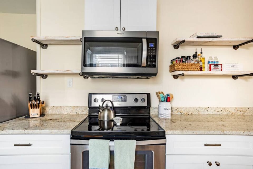 Kitchen 1: Avery side with microwave.