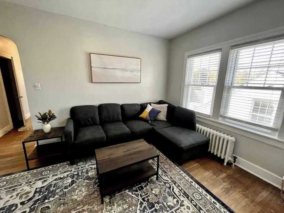 Living Room: Our living room is set up to make sure you and your loved ones have a good time. It includes a cozy 5-seater sofa and a coffee table.