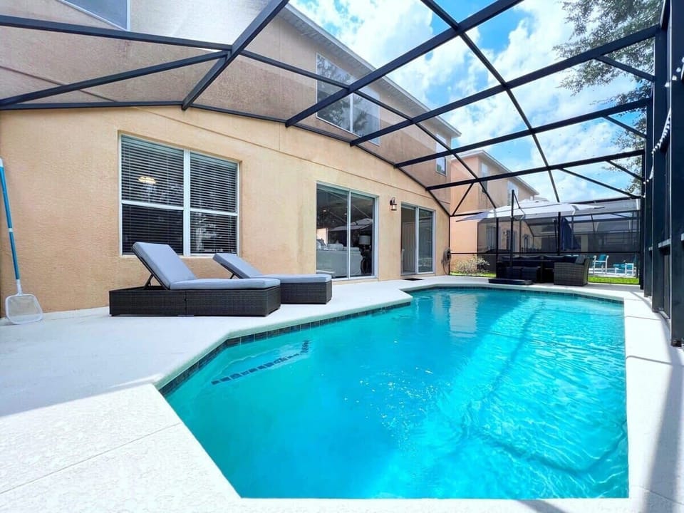 Relax by your private pool with comfortable outdoor seating, perfect for soaking up the Florida sunshine. Optional pool heat is available for an additional fee during cooler months.